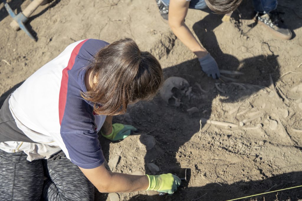 Vinča, Serbia, Sep 27, 2019: A team of archaeologists working on the site of excavations.