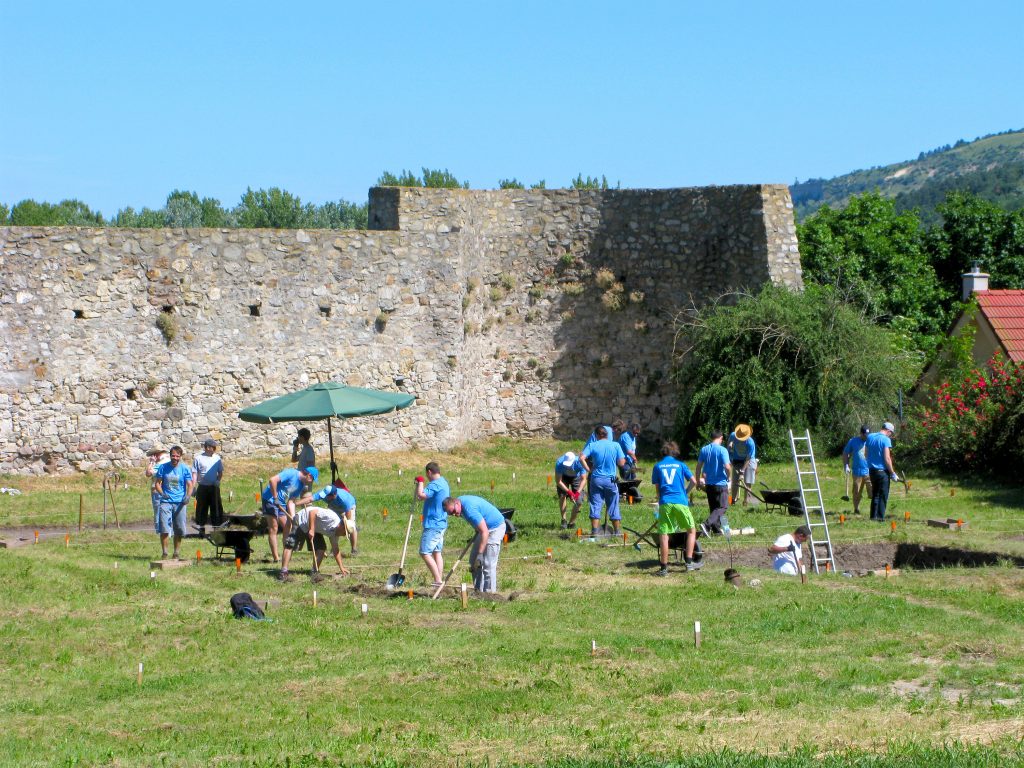 Volunteers. Group of men at archaeological excavations in the Devin castle. Bratislava, Slovakia.